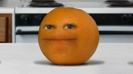 a close up of an orange with a face on it