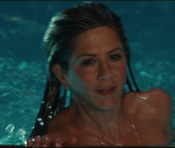 a close up of a woman 's face in a pool