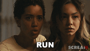 two women are standing next to each other and the word run is visible