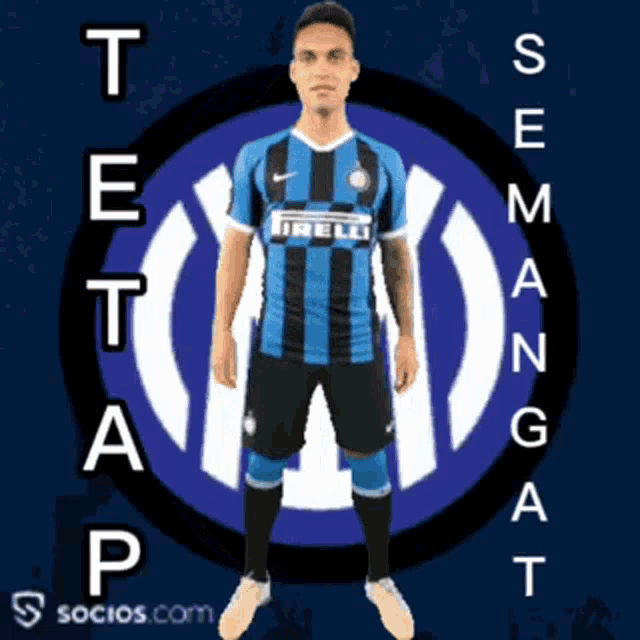 a soccer player wearing an irelli jersey stands in front of a blue and white logo