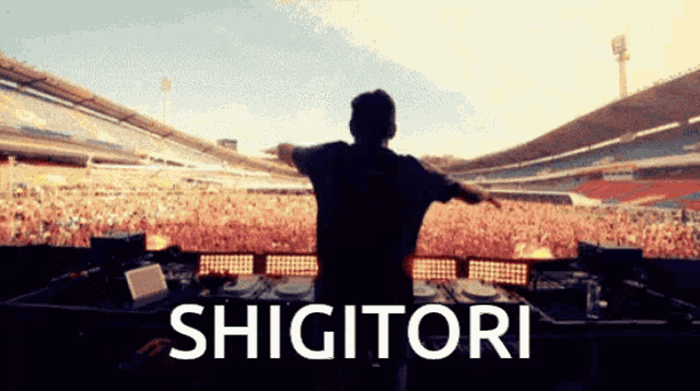 a man standing in front of a crowd with the word shigitori written on the bottom