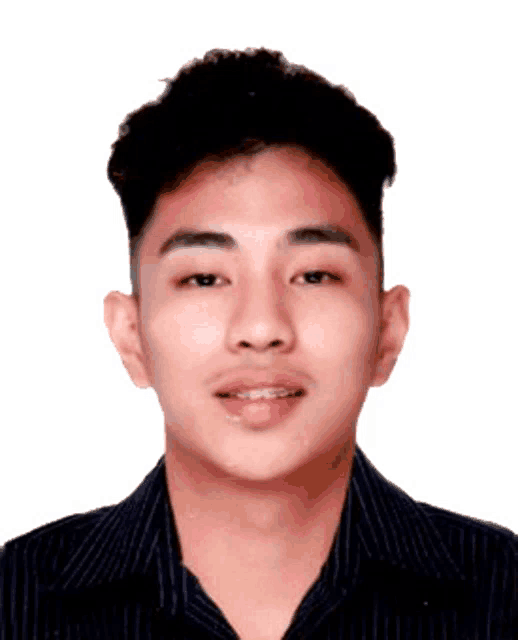 a young man with braces on his teeth is wearing a black shirt