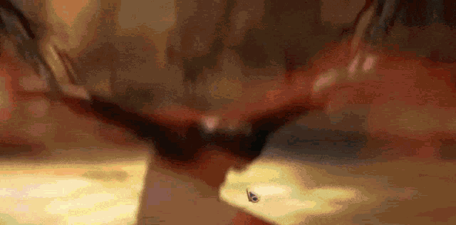 a close up of a person 's face with glasses on and a butterfly on the table .