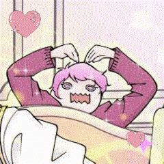 a girl with pink hair is making a heart shape with her hands while laying in bed .