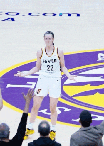 a female basketball player with the number 22 on her uniform