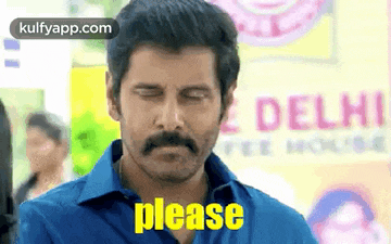 a man with a mustache and a blue shirt is making a funny face and says please .