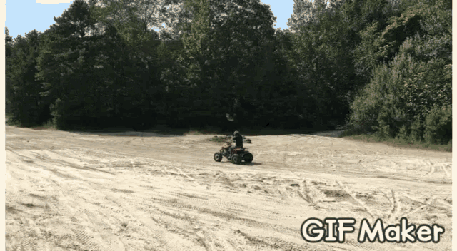 a person riding a red atv on a dirt road with the words gif maker above them