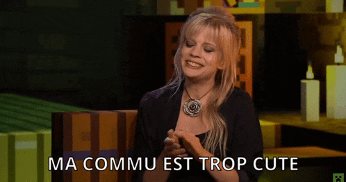 a woman is smiling with the words ma commu est trop cute written below her