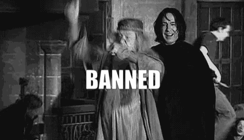 a black and white photo of a man and a woman standing next to each other with the words `` banned '' written above them .
