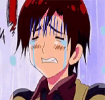 a close up of a cartoon character crying with tears running down his face .