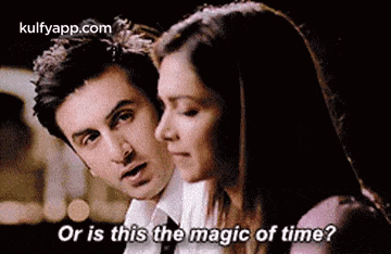 a man and a woman are sitting next to each other and the woman is asking the man if this is the magic of time .