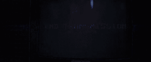 a computer monitor with a blue screen and a few white lines
