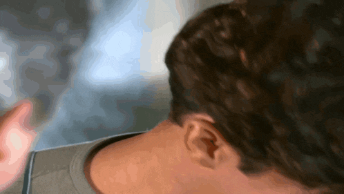 a close up of a person 's neck and ears