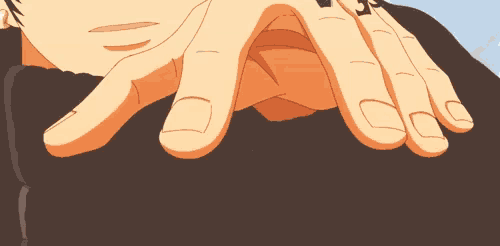a close up of a person 's hands with a circle in the middle with the letter g on it