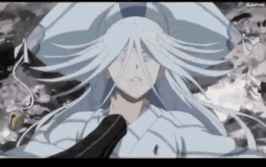 a woman with long white hair is wearing a hat