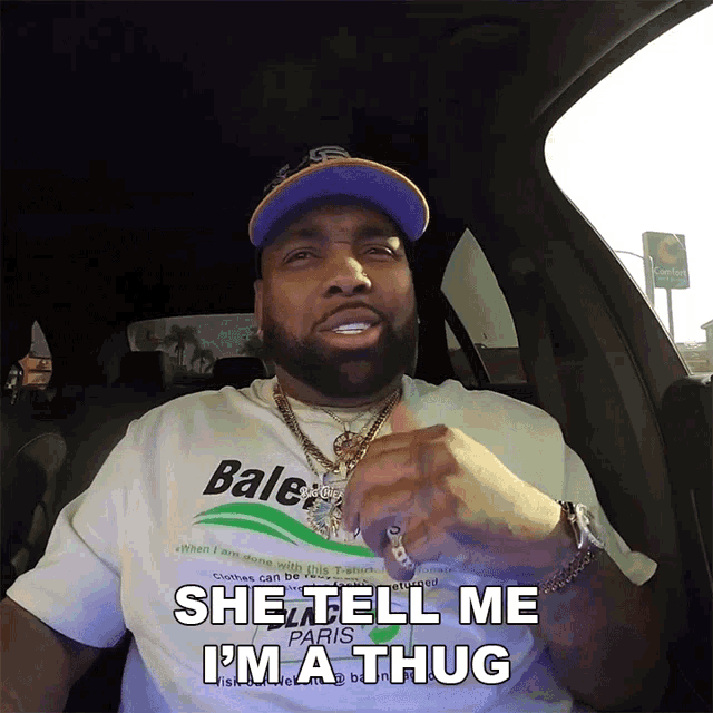a man in a balenciaga shirt says she tell me i m a thug
