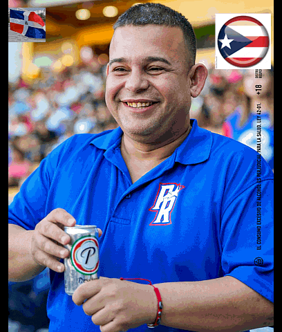 a man in a blue shirt with the letter p on the front