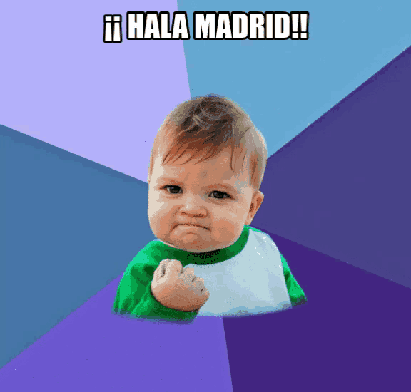 a baby with a fist in the air and the words hala madrid above him