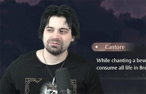 a man is making a funny face in front of a cantore sign