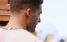 a close up of a man 's neck and head