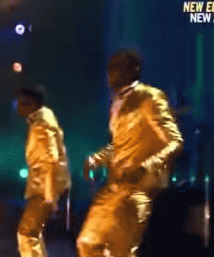 Bobby Brown Gold Suit GIF - Bobby Brown Gold Suit Woody Mc Clain GIFs