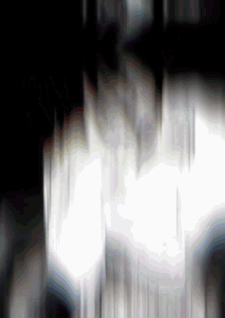 a black background with white lines and a rainbow in the middle