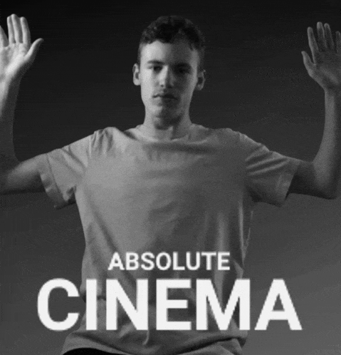 a black and white photo of a man with his arms outstretched and the words absolute cinema above him