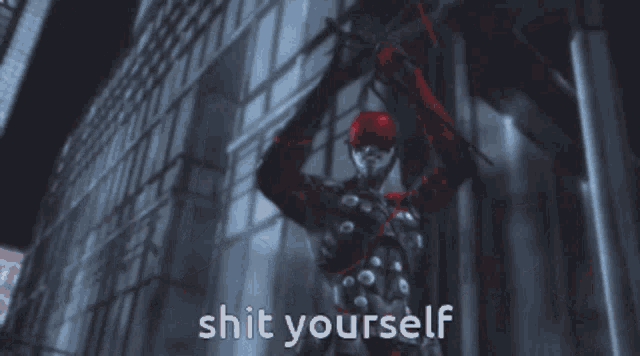 a red and black robot with the words shit yourself written on it