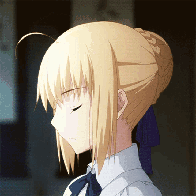 a blonde anime character with her eyes closed and a blue bow in her hair