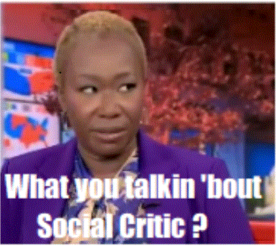 a woman in a purple suit is asking what you talkin ' bout social critic