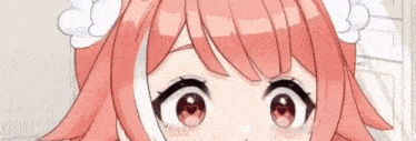 a close up of a pink haired anime girl 's eyes with hearts on them .