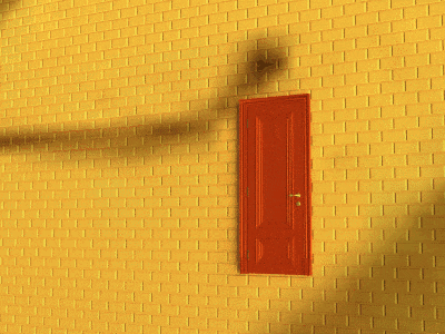 a red door with a picture of a man in a suit and tie behind it