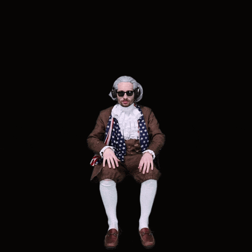 a man dressed as benjamin franklin with an american flag around his neck