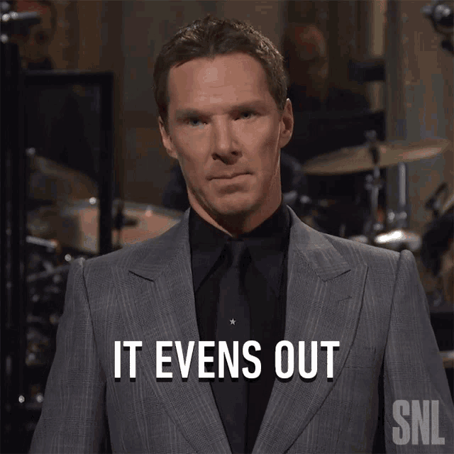 a man in a suit and tie says it evens out on snl
