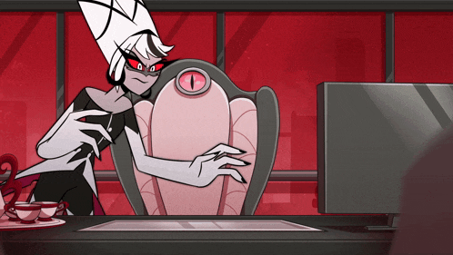 a cartoon character is sitting at a desk with a cup of tea