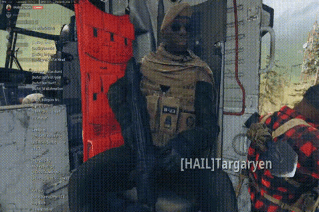 a man holding a gun with the name hail targaryen on the bottom right
