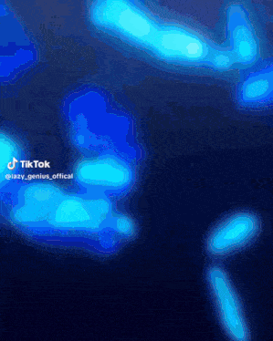 a tiktok video of a person 's face with blue lights
