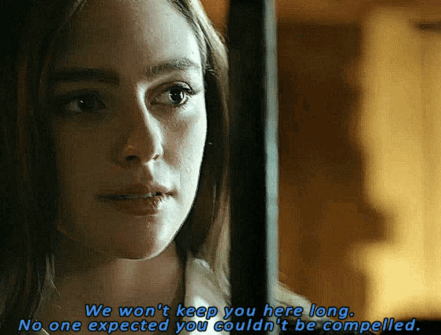 a close up of a woman 's face with the words we won t keep you here long .