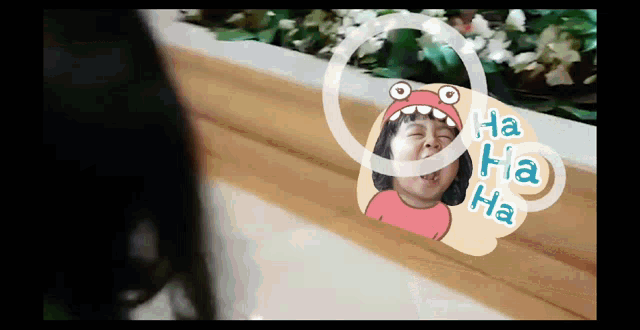 a picture of a girl with a sticker that says ha ha ha on it