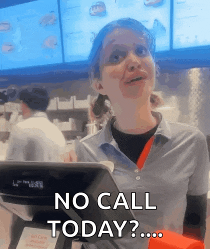 a woman behind a counter in a restaurant says no call today