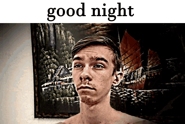 a man without a shirt is standing in front of a painting that says " good night "