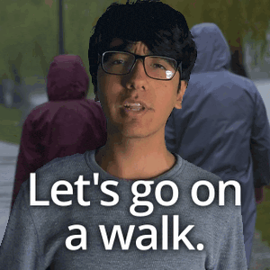 a man wearing glasses and a gray shirt says let 's go on a walk