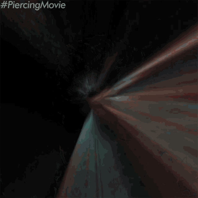 a close up of a man 's face with the hashtag #piercingmovie above him
