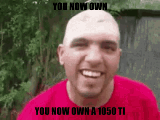a bald man in a red shirt is smiling with the words you now own a 1050 ti above him