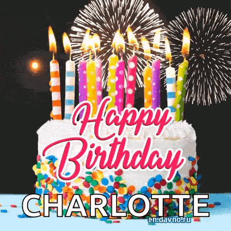 a birthday cake with candles and fireworks in the background .
