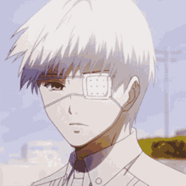 a close up of a person 's face with a bandage on their eye
