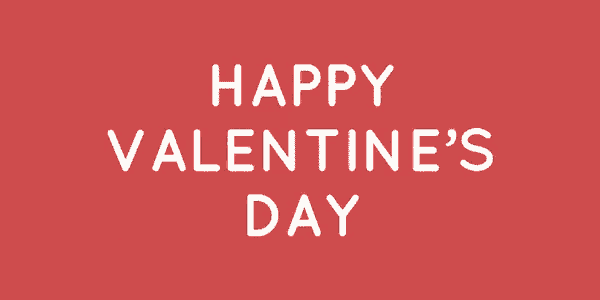 a red heart is floating in the air on a red background .