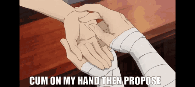 a couple of hands holding each other with the words cum on my hand then propose below them