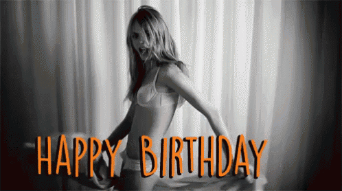 a black and white photo of a woman in lingerie with the words happy birthday written in orange