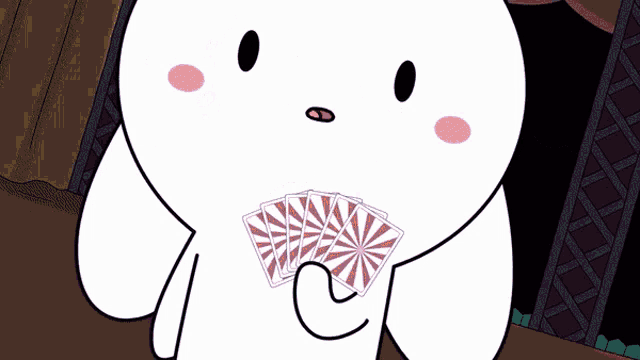 a cartoon character is holding a fan of cards in front of a purple circle with cards on it .